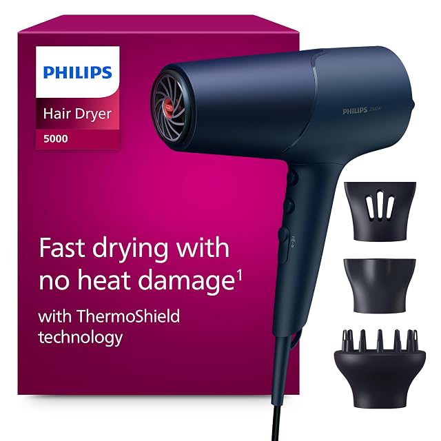 Philips 5000 Series BHD510 hair dryer in metallic blue with two nozzles and diffuser
